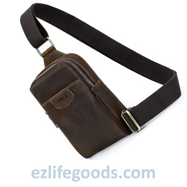 Brown leather sling bag with a strap on a white background, featuring the brand 'ezlifegoods.com'.