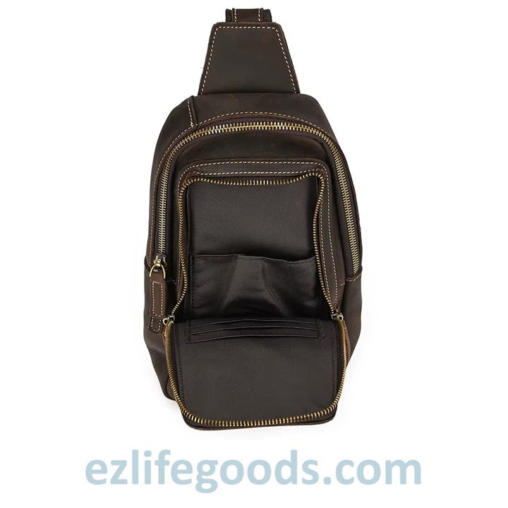 EZLIFEGOODS- Dark Brown  leather sling bag with gold zipper showing inside details, featuring the brand 'ezlifegoods.com'.