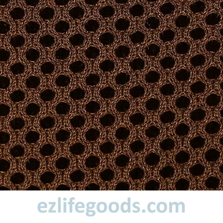Brown textured fabric with a honeycomb pattern on the back side of a sling bag, branded 'ezlifegoods.com'.