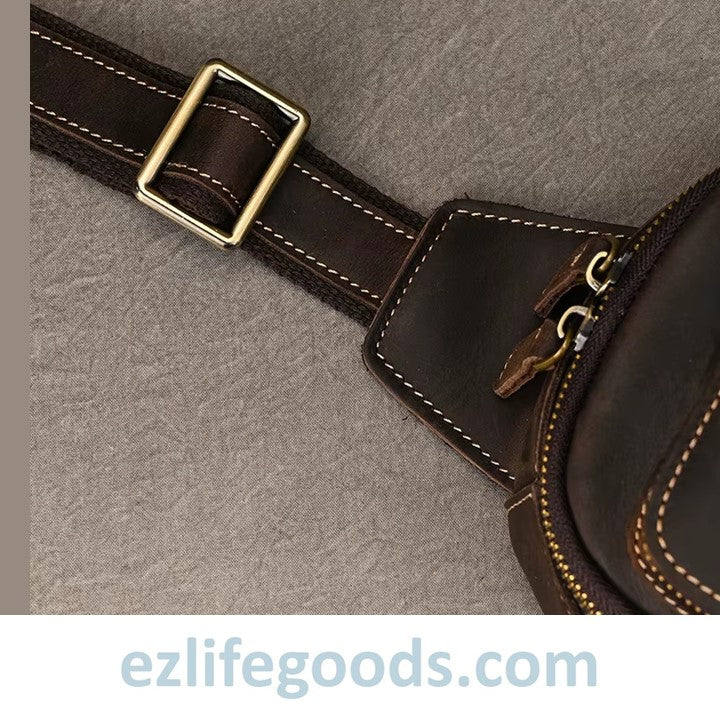 EZLIFEGOODS-Close-up of a brown leather bag with a gold buckle on a gray background