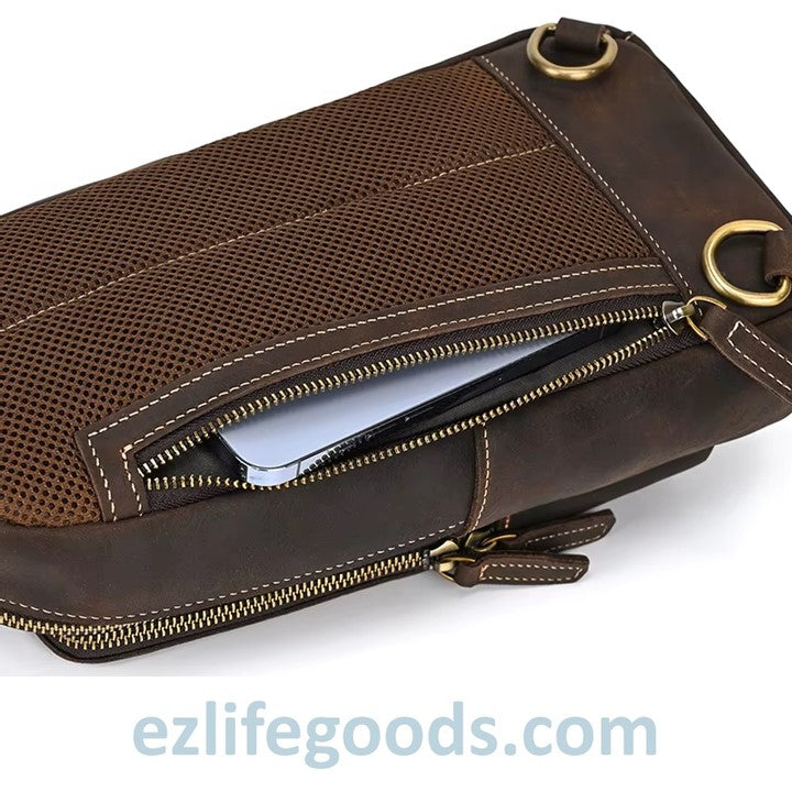 Brown leather bag with gold zipper and hardware on a white background, featuring the brand 'ezlifegoods.com'.